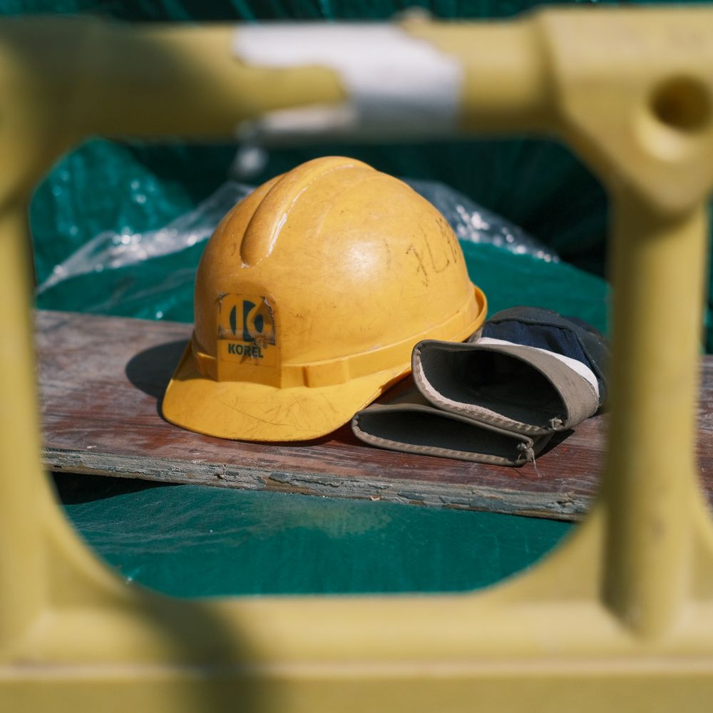Safety helmet on a structural steel beam